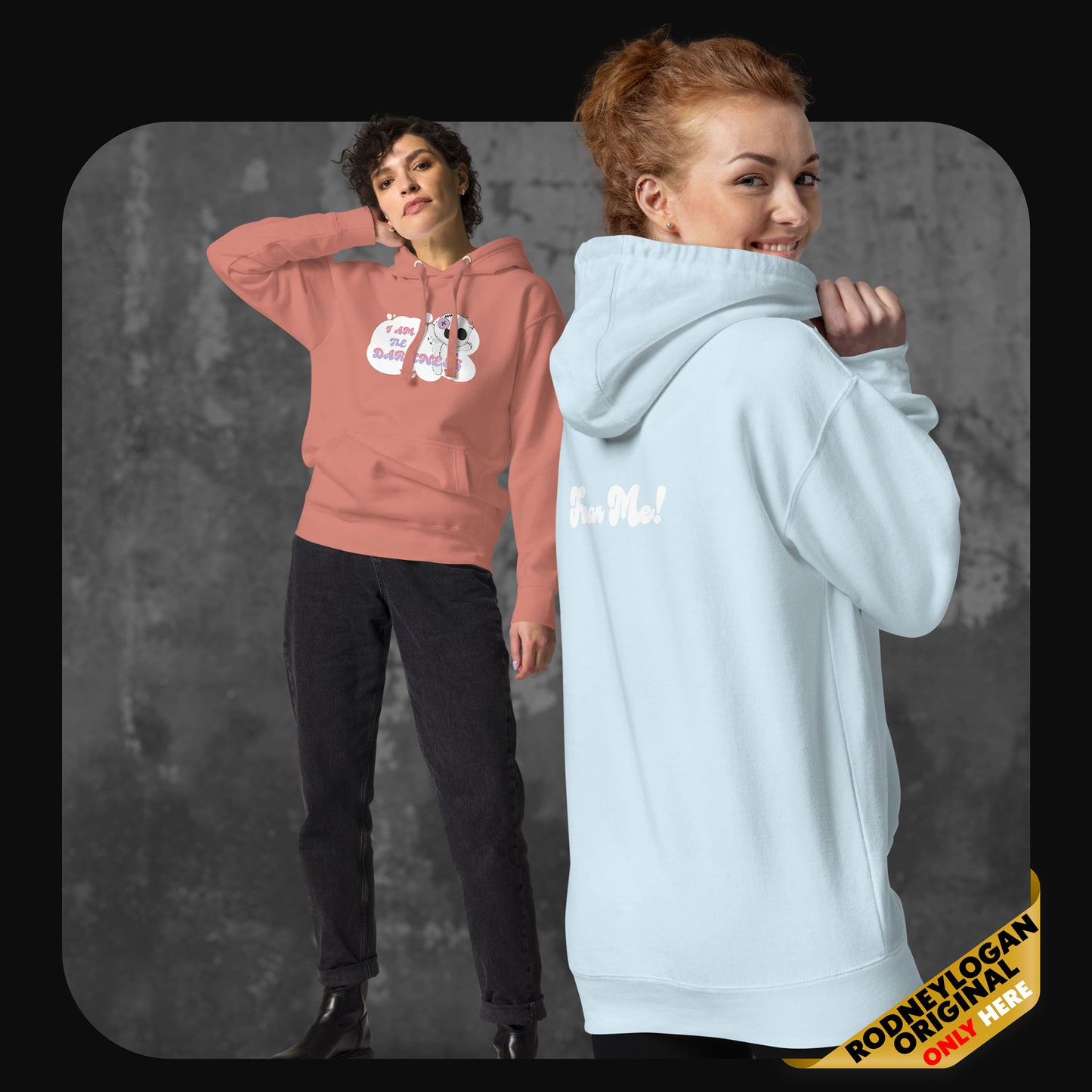 Two models wearing the hoodie in dusty rose and sky blue; one facing forward with the front design, the other turned to show the back “Fear Me!” print.