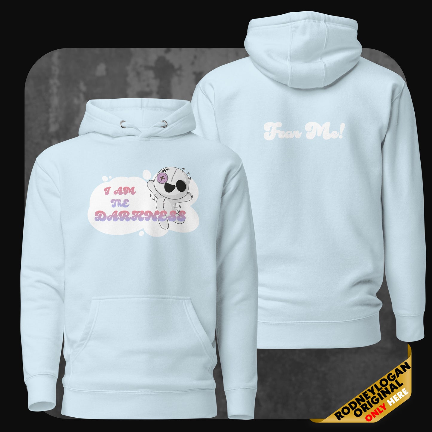 Front and back view of a light blue hoodie with the same playful goth plush design and pastel “Fear Me!” text on the back.