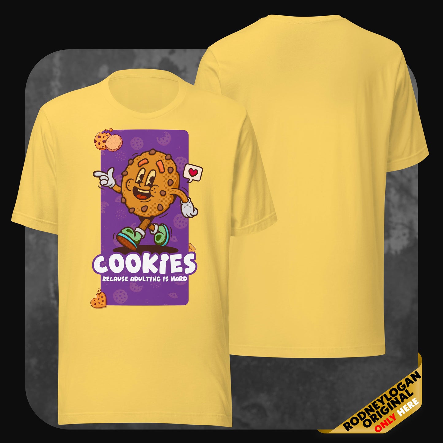 Bright yellow shirt showcasing a cartoon-style cookie character and the phrase “Cookies – Because adulting is hard” on a purple background.