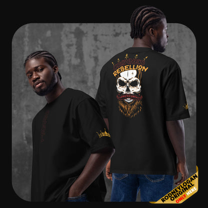 Two models wearing the black ‘Crowned Rebellion’ oversized t-shirt by RodneyLogan. The front displays a subtle vertical ‘REBEL’ text, while the back features a bold graphic of a skull with a crown and fiery beard, with ‘CROWNED REBELLION’ text above.