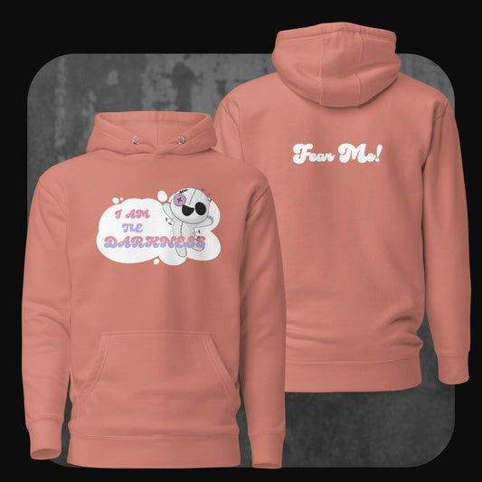 Front and back view of a dusty rose-colored hoodie showing the plush character design with pastel typography and a “Fear Me!” slogan in white on the back.