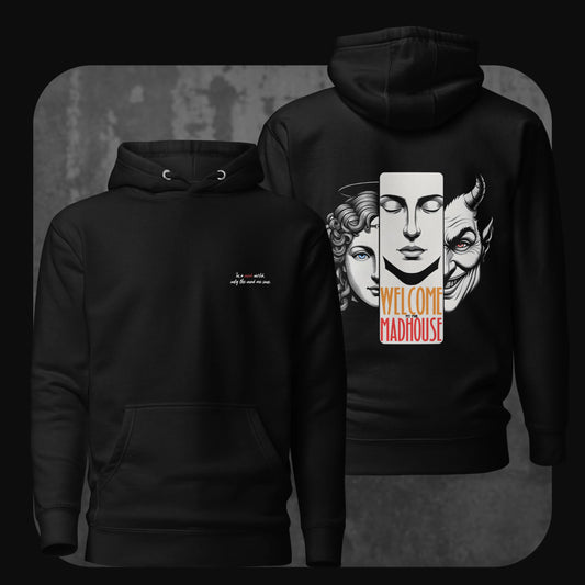 Front and back view of a black hoodie with the text “In a mad world, only the mad are sane” on the chest and a surreal graphic of three faces on the back with “Welcome to the Madhouse” typography.
