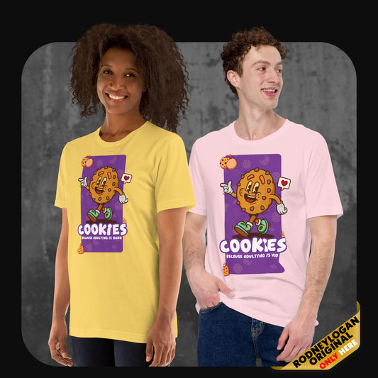 Two models wearing graphic t-shirts with a cartoon cookie character and the phrase “Cookies – Because adulting is hard.” One wears yellow, the other pink.