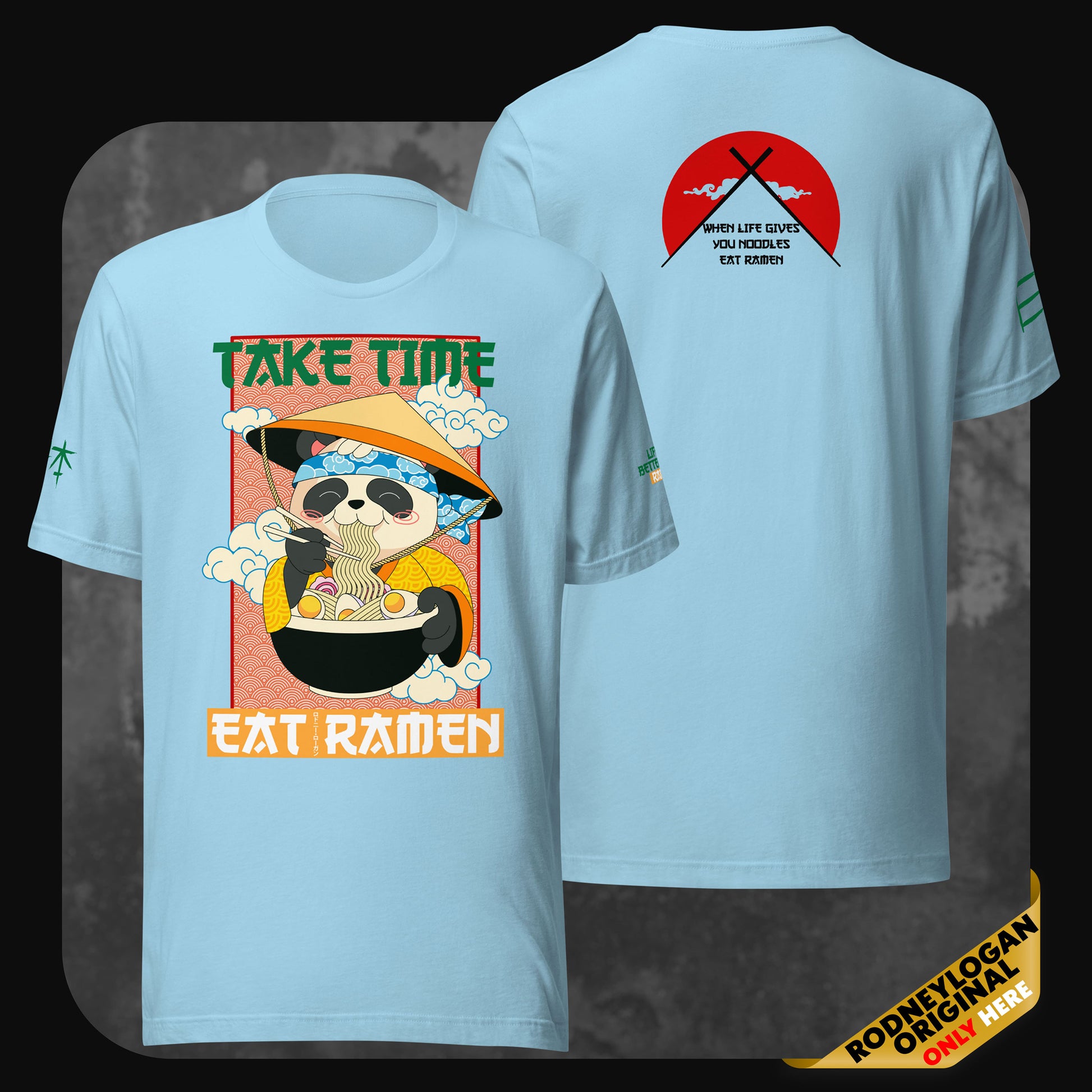 Front and back view of a light blue t-shirt featuring a sloth enjoying ramen and the motivational message “Take Time Eat Ramen”; back includes a chopsticks and red sun graphic.